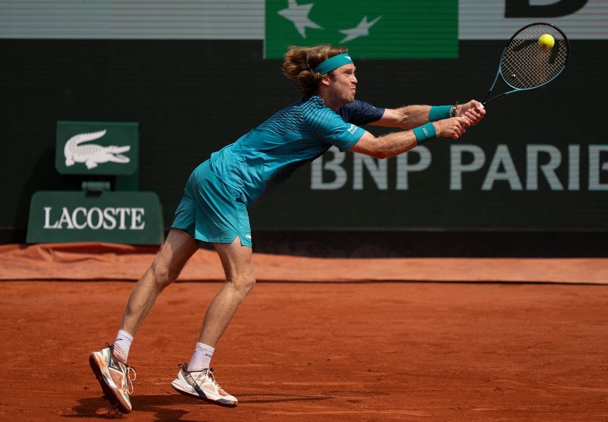 May 29, 2026; Paris, France; Andrey Rublev returns a shot during his match against Nuno Borges of Portugal on day six at Stade Roland Garros. Mandatory Credit: Susan Mullane-Imagn Images