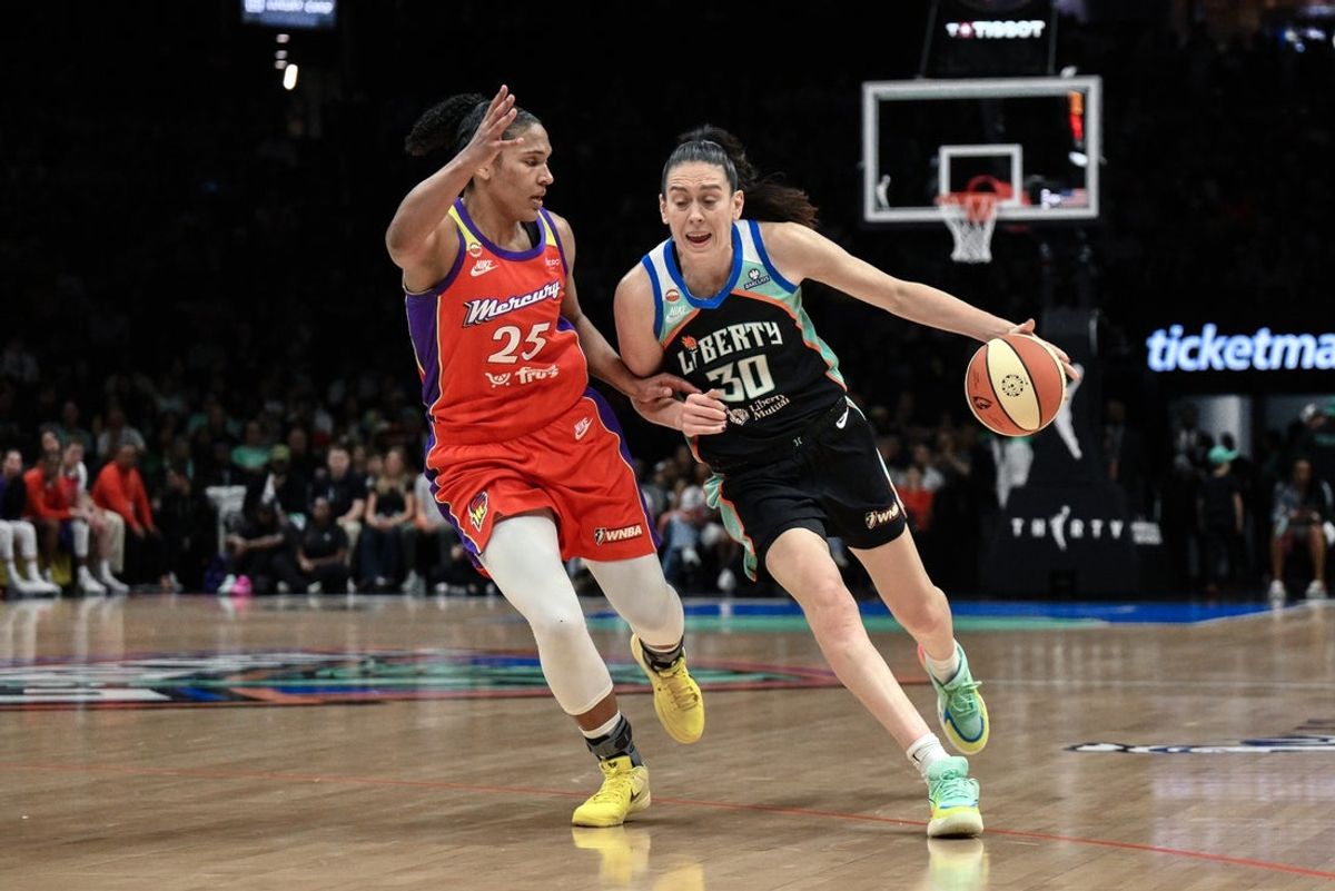 May 29, 2026; Brooklyn, New York, USA; New York Liberty forward Breanna Stewart (30) tries to drive past Phoenix Mercury forward Alyssa Thomas (25) during the first half at Barclays Center. Mandatory Credit: John Jones-Imagn Images