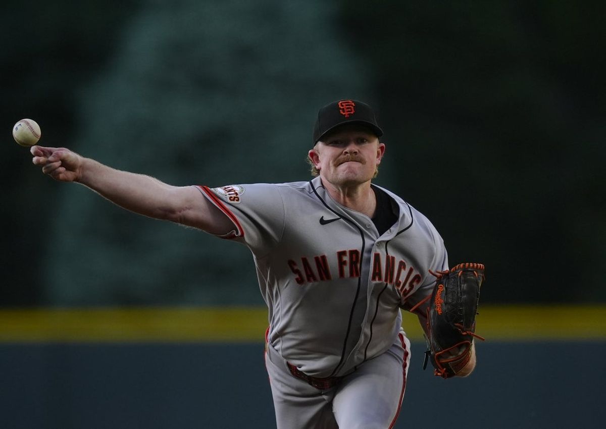 May 29, 2026; Denver, Colorado, USA; San Francisco Giants starting pitcher Logan Webb (62) delivers a pitch in the first inning against the Colorado Rockies at Coors Field. Mandatory Credit: Ron Chenoy-Imagn Images