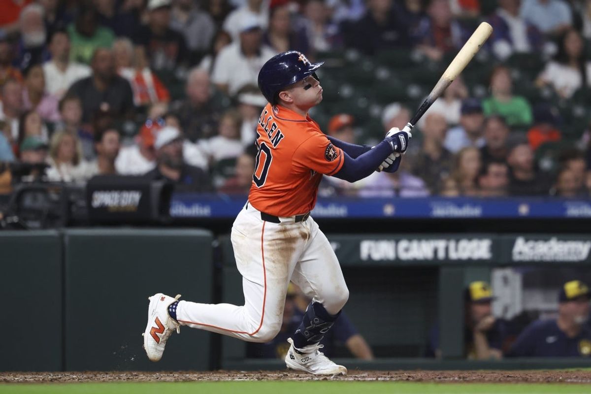 May 29, 2026; Houston, Texas, USA; Houston Astros second baseman Nick Allen (20) drives in a run with a sacrifice fly during the fourth inning against the Milwaukee Brewers at Daikin Park. Mandatory Credit: Troy Taormina-Imagn Images