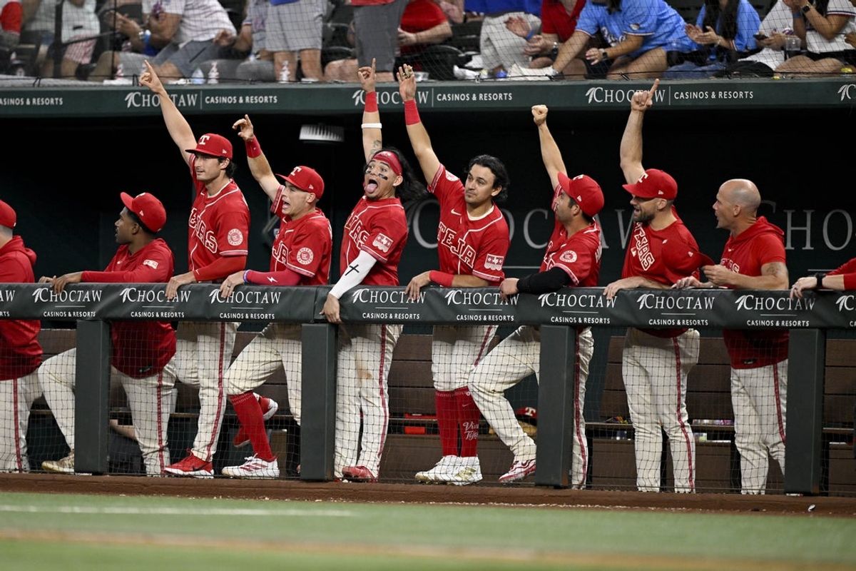 May 29, 2026; Arlington, Texas, USA;  The Texas Rangers bench celebrates as right fielder Brandon Nimmo (not pictured) hits a two run home run against the Kansas City Royals during the fifth inning at Globe Life Field. Mandatory Credit: Jerome Miron-Imagn Images