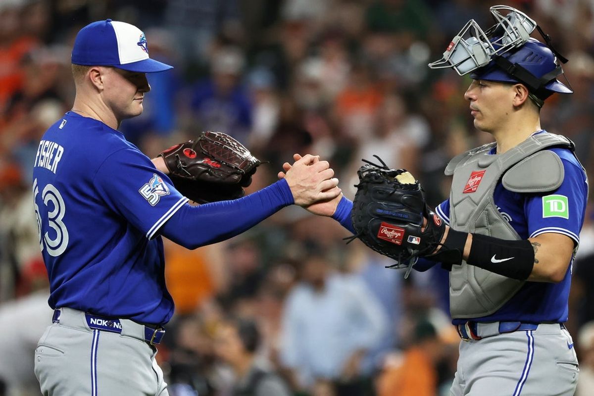May 29, 2026; Baltimore, Maryland, USA; Toronto Blue Jays pitcher Braydon Fisher (63) celebrates with Toronto Blue Jays catcher Brandon Valenzuela (59) after a game against the Baltimore Orioles at Oriole Park at Camden Yards. Mandatory Credit: Daniel Kucin Jr.-Imagn Images