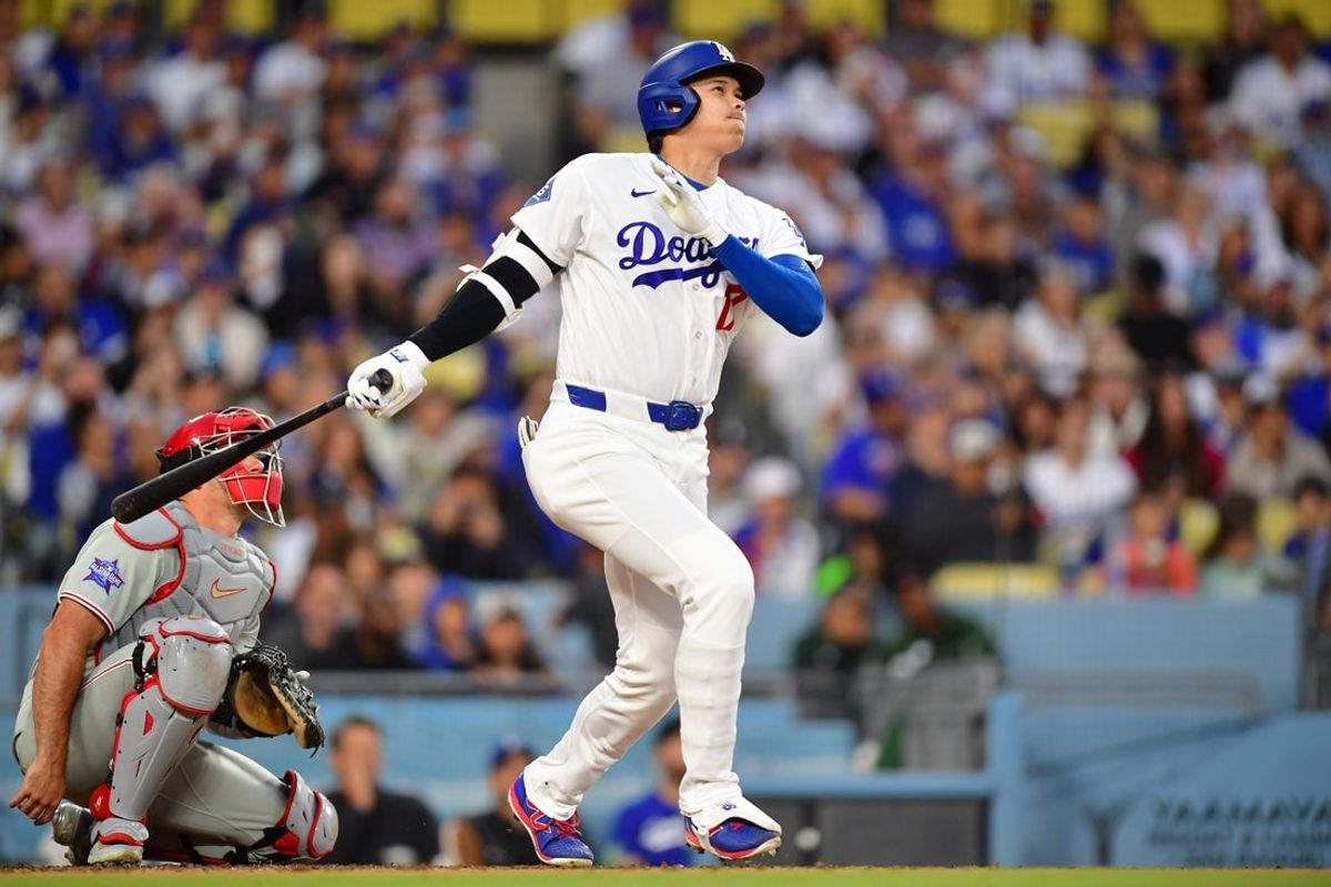 May 29, 2026; Los Angeles, California, USA; Los Angeles Dodgers two-way player Shohei Ohtani (17) hits a home run against the Philadelphia Phillies in the third inning at Dodger Stadium. Mandatory Credit: Gary A. Vasquez-Imagn Images