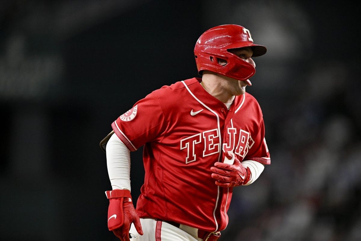 May 29, 2026; Arlington, Texas, USA;  Texas Rangers designated hitter Joc Pederson (3) celebrates as he rounds the bases after he hits a home run against the Kansas City Royals during the eighth inning at Globe Life Field. Mandatory Credit: Jerome Miron-Imagn Images