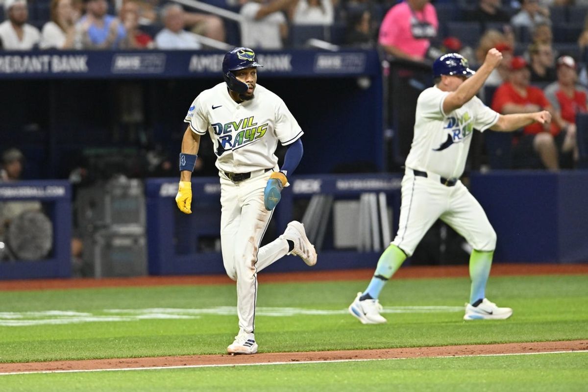 May 29, 2026; St. Petersburg, Florida, USA; Tampa Bay Rays outfielder Chandler Simpson (14) runs to home during the seventh inning against Los Angeles Angels at Tropicana Field. Mandatory Credit: Pablo Robles-Imagn Images