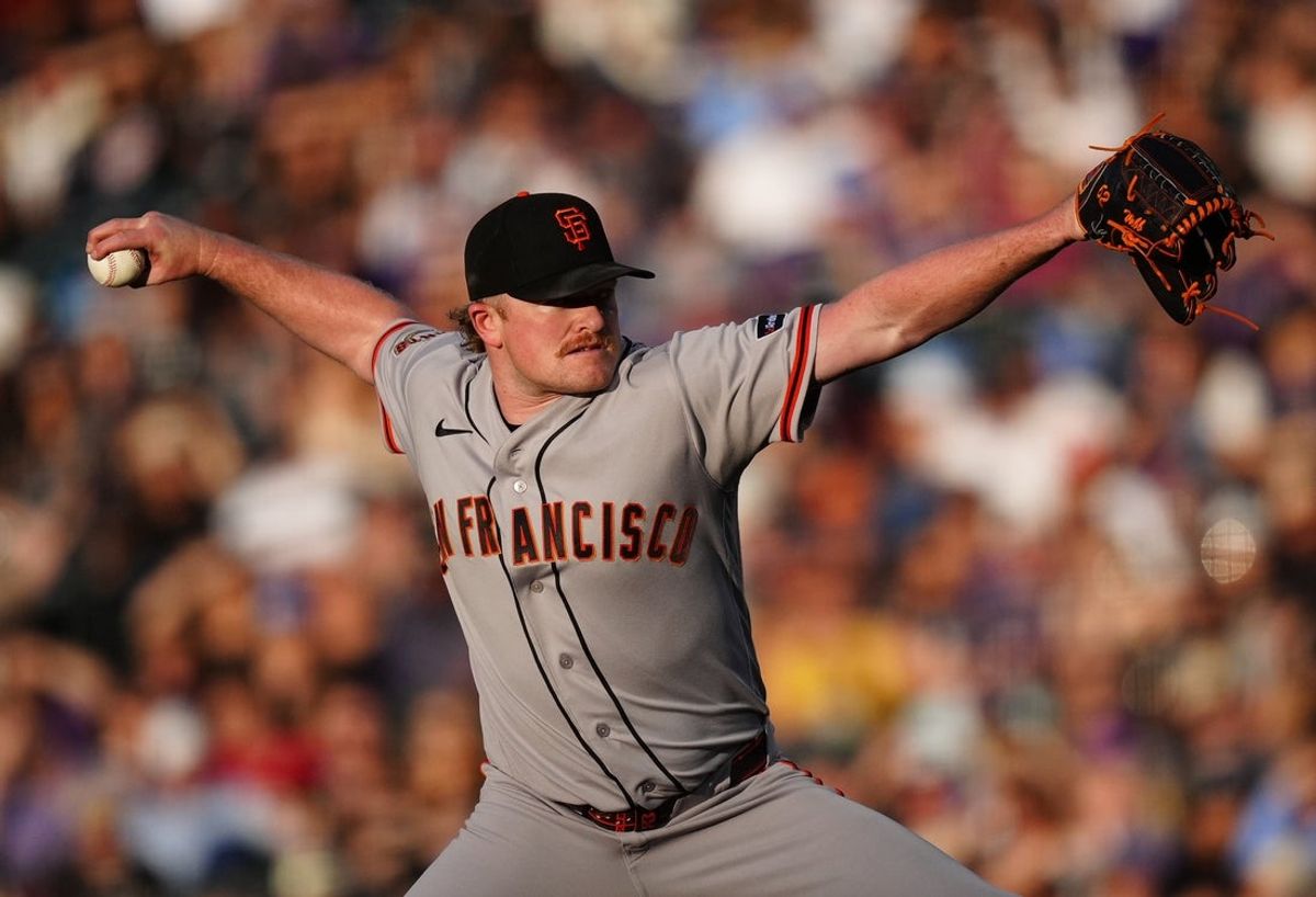 May 29, 2026; Denver, Colorado, USA; San Francisco Giants starting pitcher Logan Webb (62) delivers a pitch in the third inning against the Colorado Rockies at Coors Field. Mandatory Credit: Ron Chenoy-Imagn Images