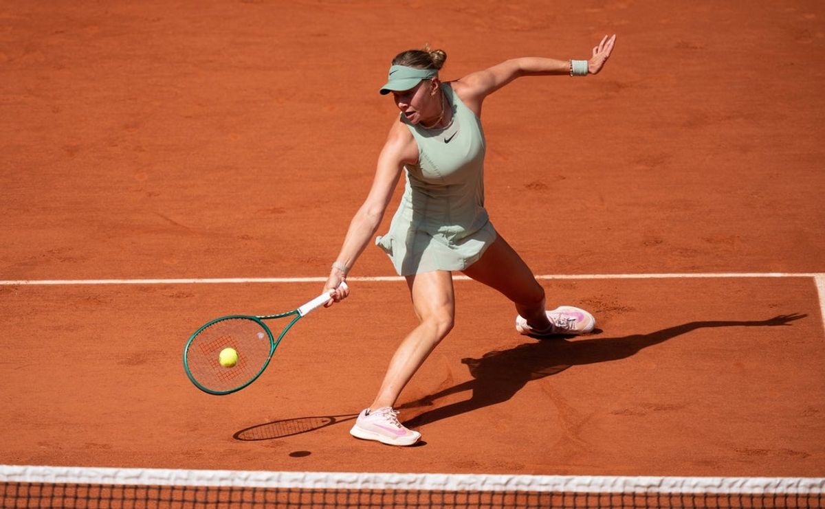 May 30, 2026; Paris, France; Amanda Anisimova of the United States returns a shot during her match against Diane Parry of France on day seven at Stade Roland Garros. Mandatory Credit: Susan Mullane-Imagn Images