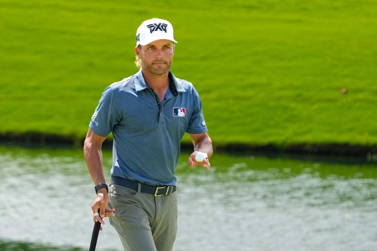 May 30, 2026; Fort Worth, Texas, USA; Eric Cole reacts on the 18th green  following his round of 7-under 63, and the clubhouse lead during the third round of the Charles Schwab Challenge golf tournament.Mandatory Credit: Raymond Carlin III-Imagn Images