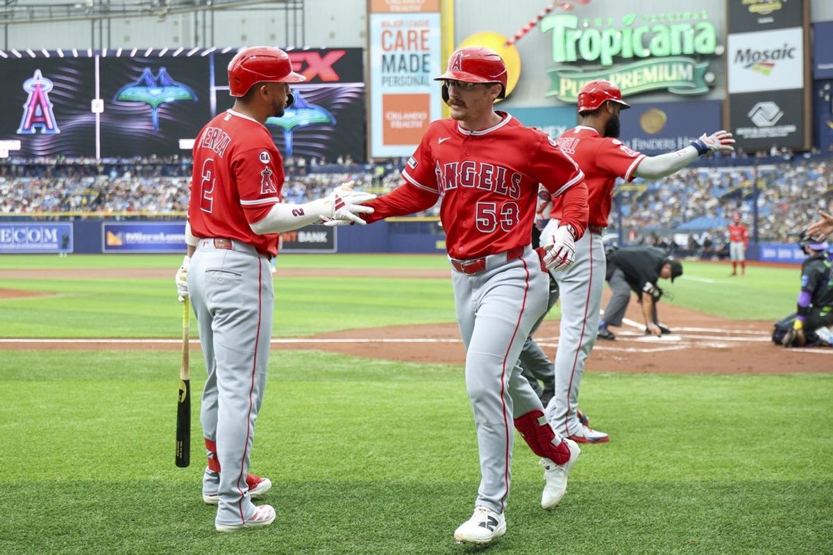 May 30, 2026; St. Petersburg, Florida, USA; Los Angeles Angels second baseman Oswald Peraza (2) greets left fielder Wade Meckler (53) after hitting a grand slam against the Tampa Bay Rays in the first inning at Tropicana Field. Mandatory Credit: Nathan Ray Seebeck-Imagn Images