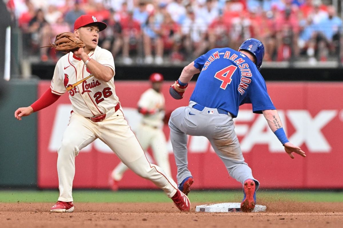 May 30, 2026; St. Louis, Missouri, USA; Chicago Cubs center fielder Pete Crow-Armstrong (4) is safe from St. Louis Cardinals second baseman JJ Wetherholt (26) during the third inning at Busch Stadium. Mandatory Credit: Jeff Le-Imagn Images