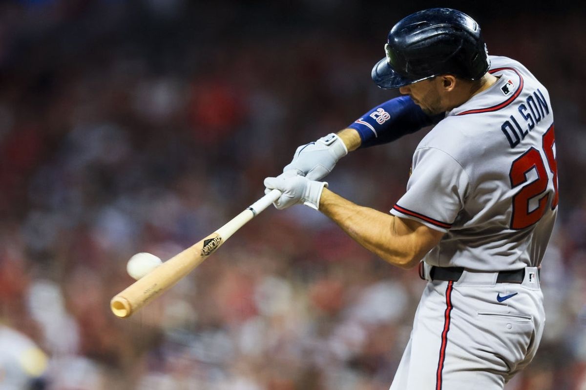 May 30, 2026; Cincinnati, Ohio, USA; Atlanta Braves first baseman Matt Olson (28) hits a solo home run in the seventh inning against the Cincinnati Reds at Great American Ball Park. Mandatory Credit: Katie Stratman-Imagn Images