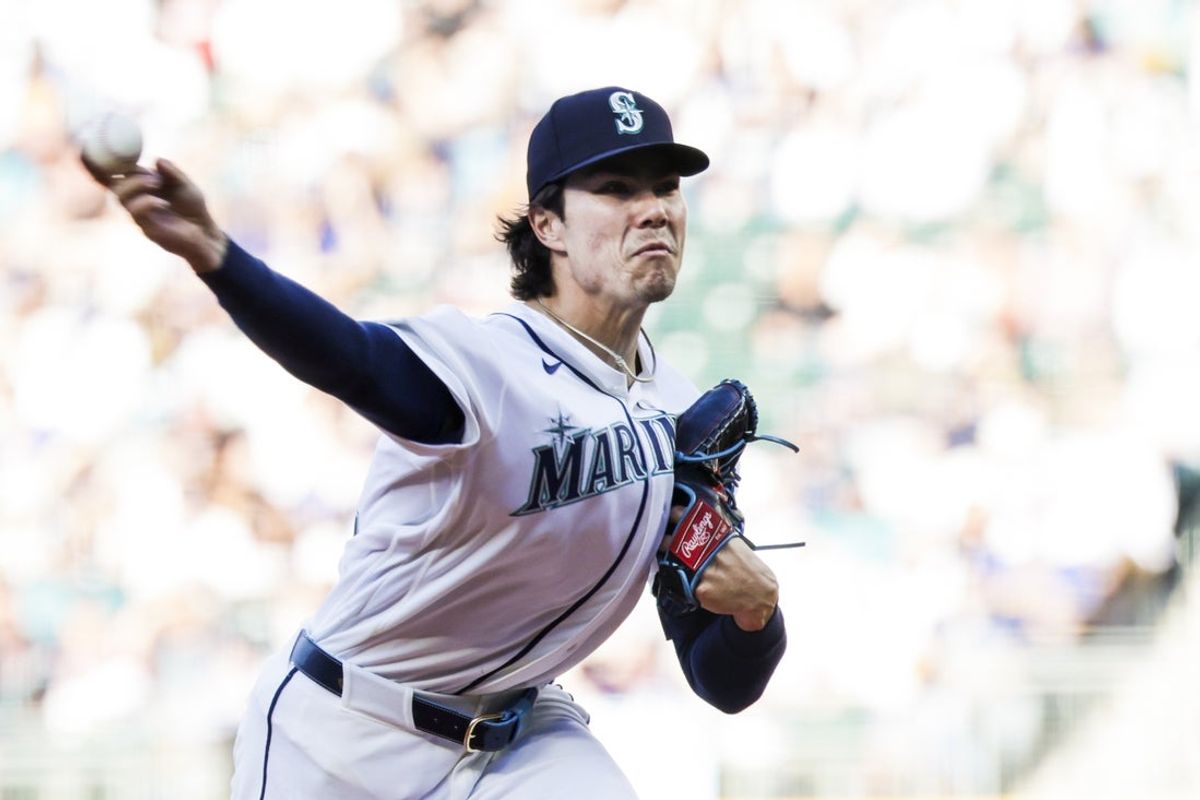 May 30, 2026; Seattle, Washington, USA; Seattle Mariners starting pitcher Bryan Woo (22) throws against the Arizona Diamondbacks during the first inning at T-Mobile Park. Mandatory Credit: Joe Nicholson-Imagn Images