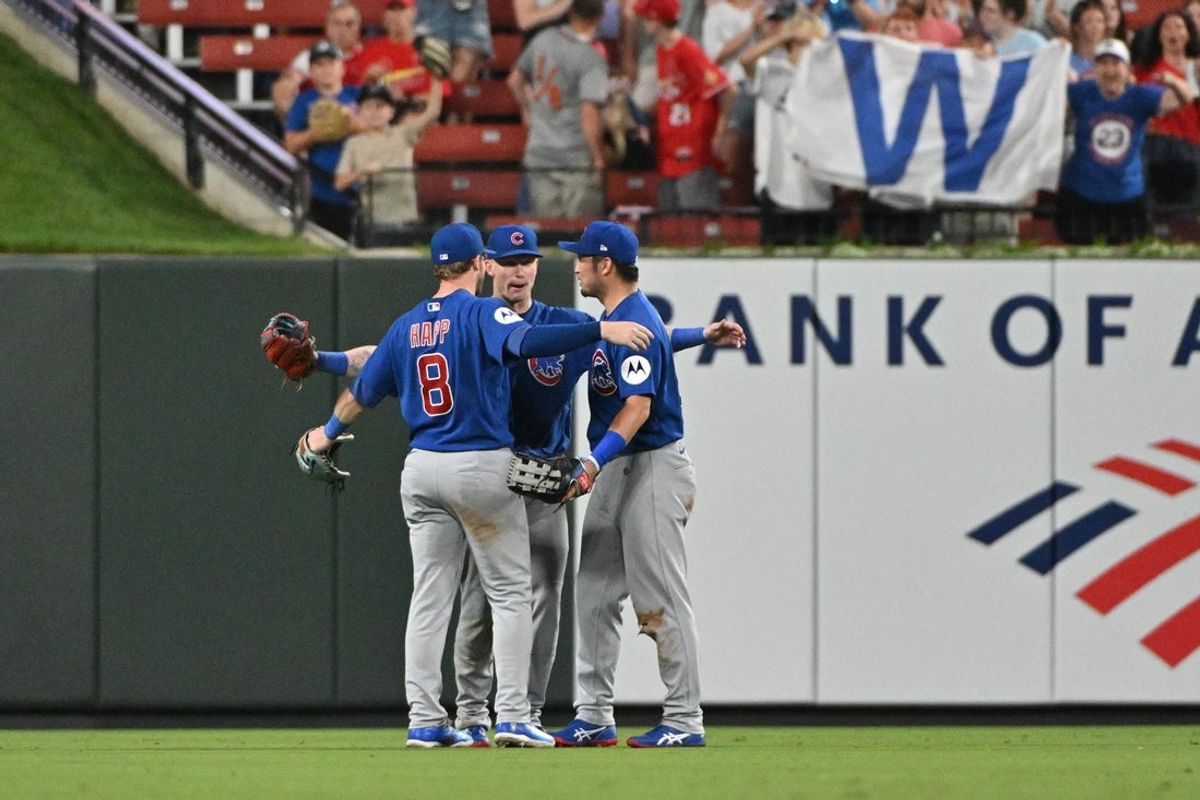 May 30, 2026; St. Louis, Missouri, USA; Chicago Cubs left fielder Ian Happ (8) celebrates with center fielder Pete Crow-Armstrong (4) and right fielder Seiya Suzuki (27) after defeating the St. Louis Cardinals at Busch Stadium. Mandatory Credit: Jeff Le-Imagn Images