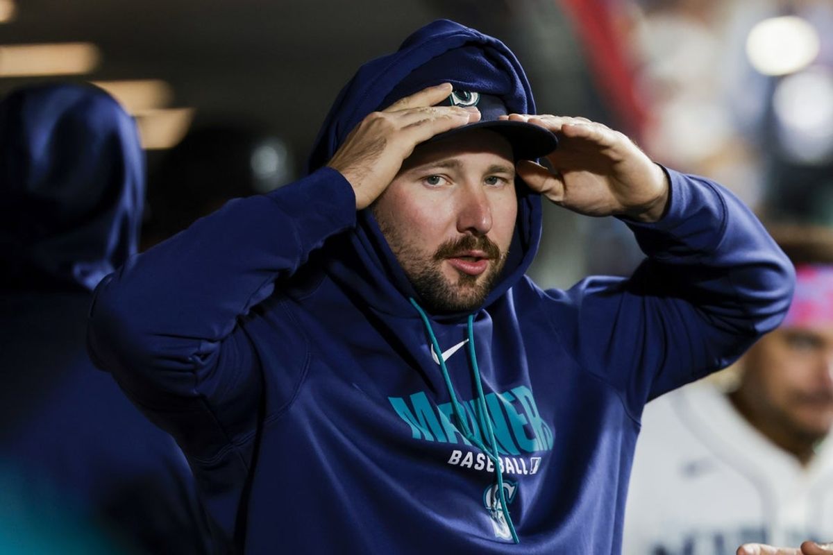 May 30, 2026; Seattle, Washington, USA; Seattle Mariners catcher Cal Raleigh (29) stands in the dugout during the eighth inning against the Arizona Diamondbacks at T-Mobile Park. Mandatory Credit: Joe Nicholson-Imagn Images