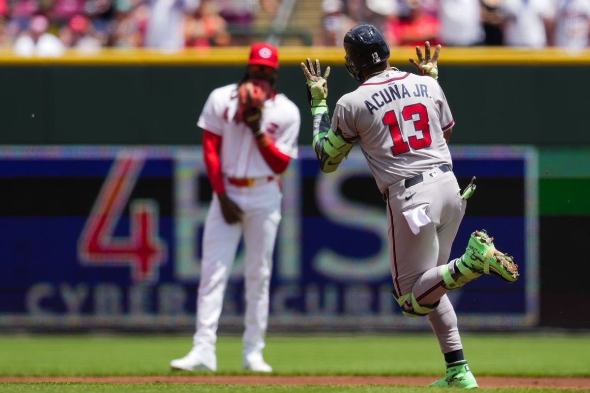 May 31, 2026; Cincinnati, Ohio, USA;  Atlanta Braves outfielder Ronald Acuna Jr. gestures as he runs the bases after hitting a solo home run against the Cincinnati Reds in the first inning at Great American Ball Park. Mandatory Credit: Aaron Doster-Imagn Images