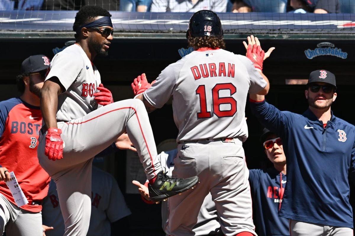 May 31, 2026; Cleveland, Ohio, USA; Boston Red Sox center fielder Jarren Duran (16) celebrates with shortstop Andruw Monasterio, left, after scoring during the seventh inning against the Cleveland Guardians at Progressive Field. Mandatory Credit: Ken Blaze-Imagn Images