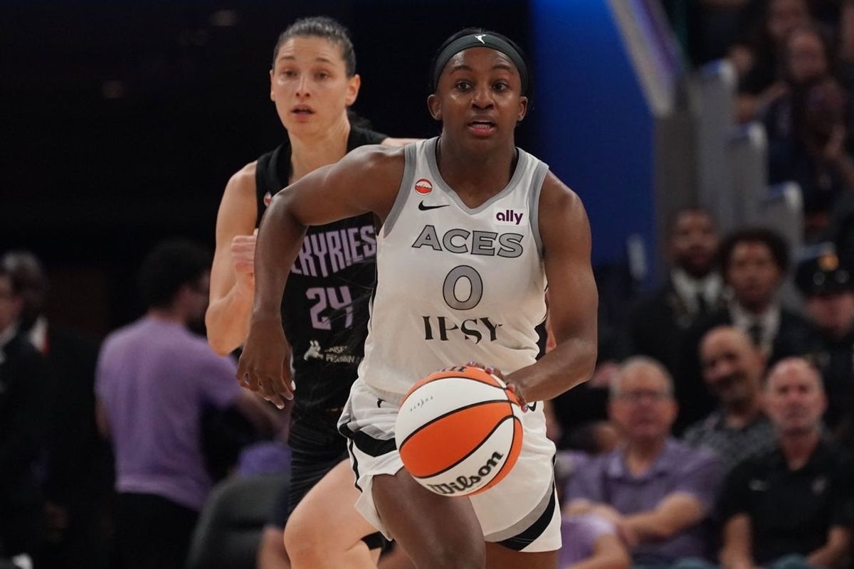May 31, 2026; San Francisco, California, USA;  Las Vegas Aces guard Jackie Young (0) dribbles upcourt past Golden State Valkyries forward Cecilia Zandalasini (24) in the second quarter at Chase Center. Mandatory Credit: David Gonzales-Imagn Images
