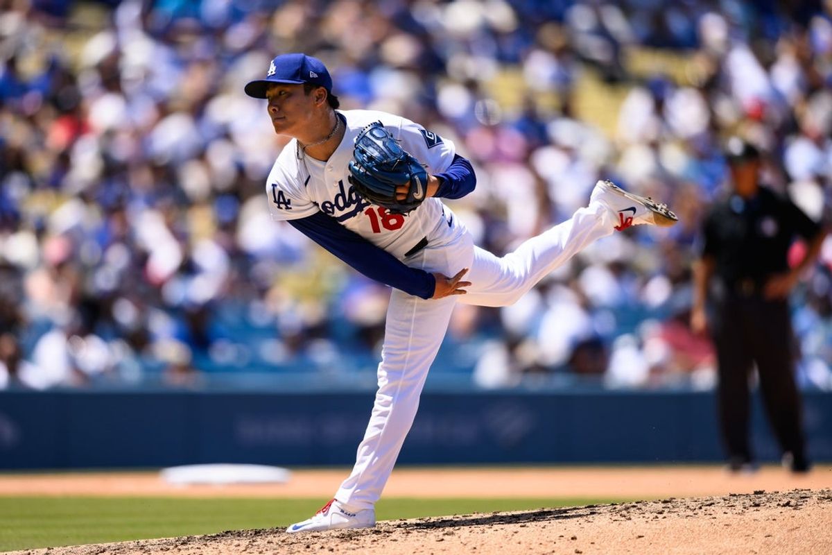 May 31, 2026; Los Angeles, California, USA; Los Angeles Dodgers pitcher Yoshinobu Yamamoto (18) delivers during the fourth inning against the Philadelphia Phillies at Dodger Stadium. Mandatory Credit: William Liang-Imagn Images