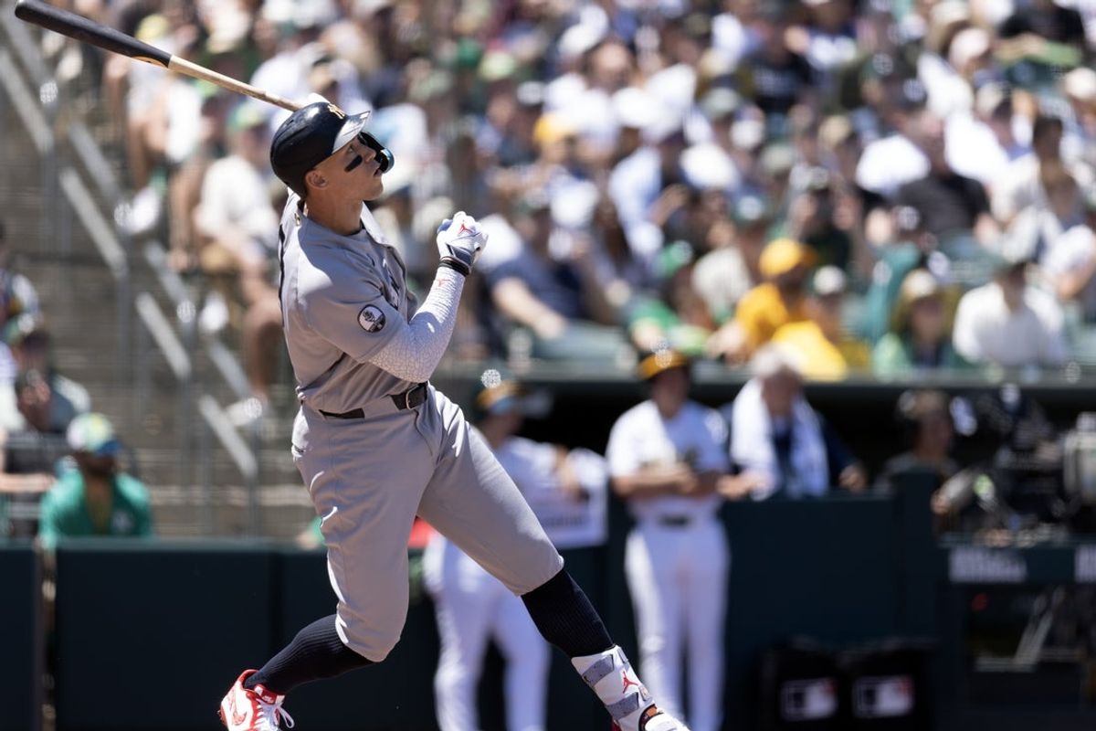 May 31, 2026; West Sacramento, California, USA; New York Yankees right fielder Aaron Judge (99) tracks the ball on a single against the Athletics during the third inning at Sutter Health Park. Mandatory Credit: D. Ross Cameron-Imagn Images