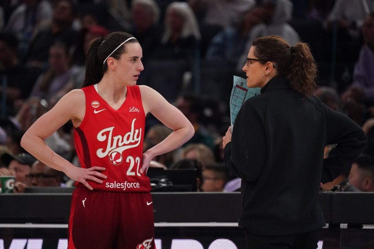 May 28, 2026; San Francisco, California, USA;  Indiana Fever guard Caitlin Clark (22) talks with head coach Stephanie White during a game against the Golden State Valkyries in the second quarter at Chase Center. Mandatory Credit: David Gonzales-Imagn Images