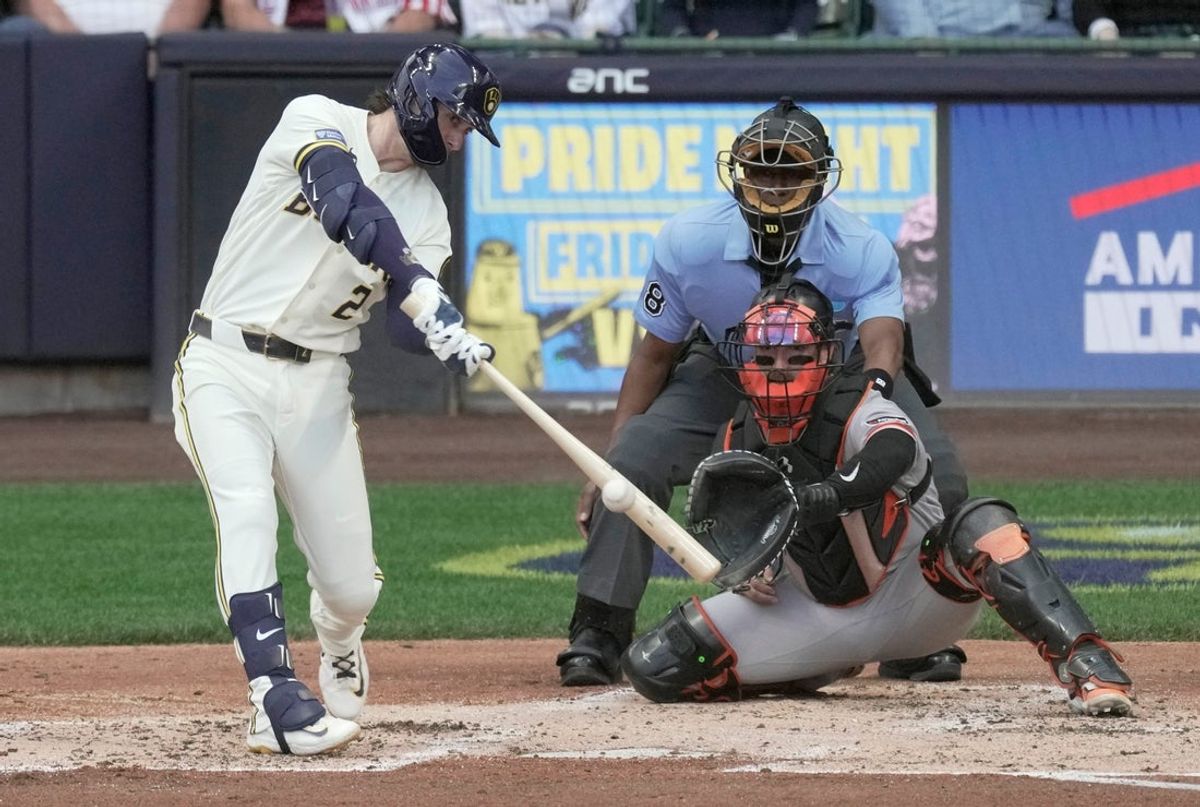 Milwaukee Brewers second baseman Brice Turang (2) hits a two-run triple during the second inning of their game against the San Francisco Giants Monday, June 1, 2026 at American Family Field in Milwaukee, Wisconsin.