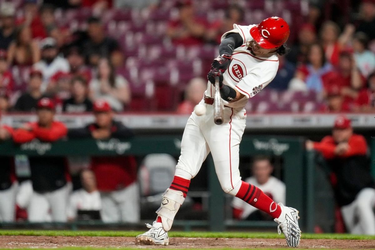 Cincinnati Reds second baseman Edwin Arroyo (2) hits a single for his first MLB career hit in the ninth inning of the MLB Interleague game between the Cincinnati Reds and the Kansas City Royals at Great American Ball Park in Cincinnati on Monday, June 1, 2026. The Royals won 9-2.