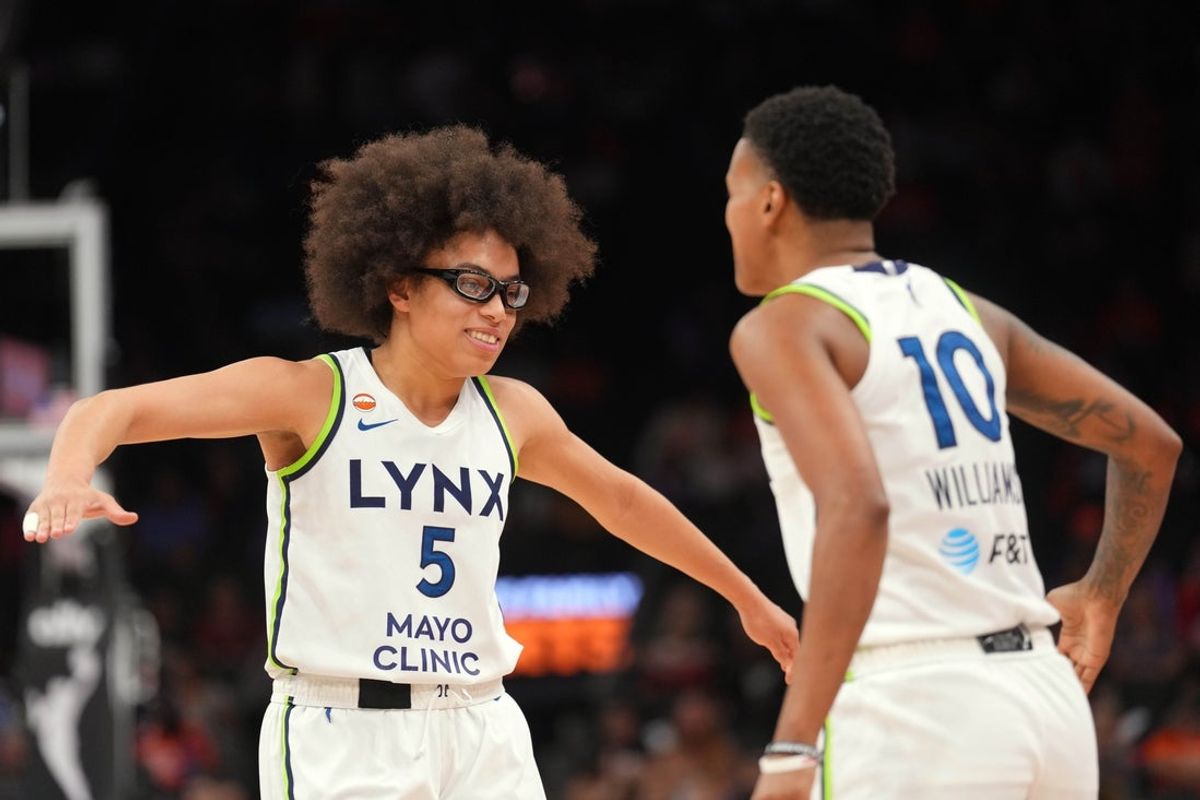 Jun 1, 2026; Phoenix, Arizona, USA; Minnesota Lynx guard Olivia Miles (5) and Minnesota Lynx guard Courtney Williams (10) slap hands during the second half of the game against the Phoenix Mercury at Mortgage Matchup Center. Mandatory Credit: Joe Camporeale-Imagn Images