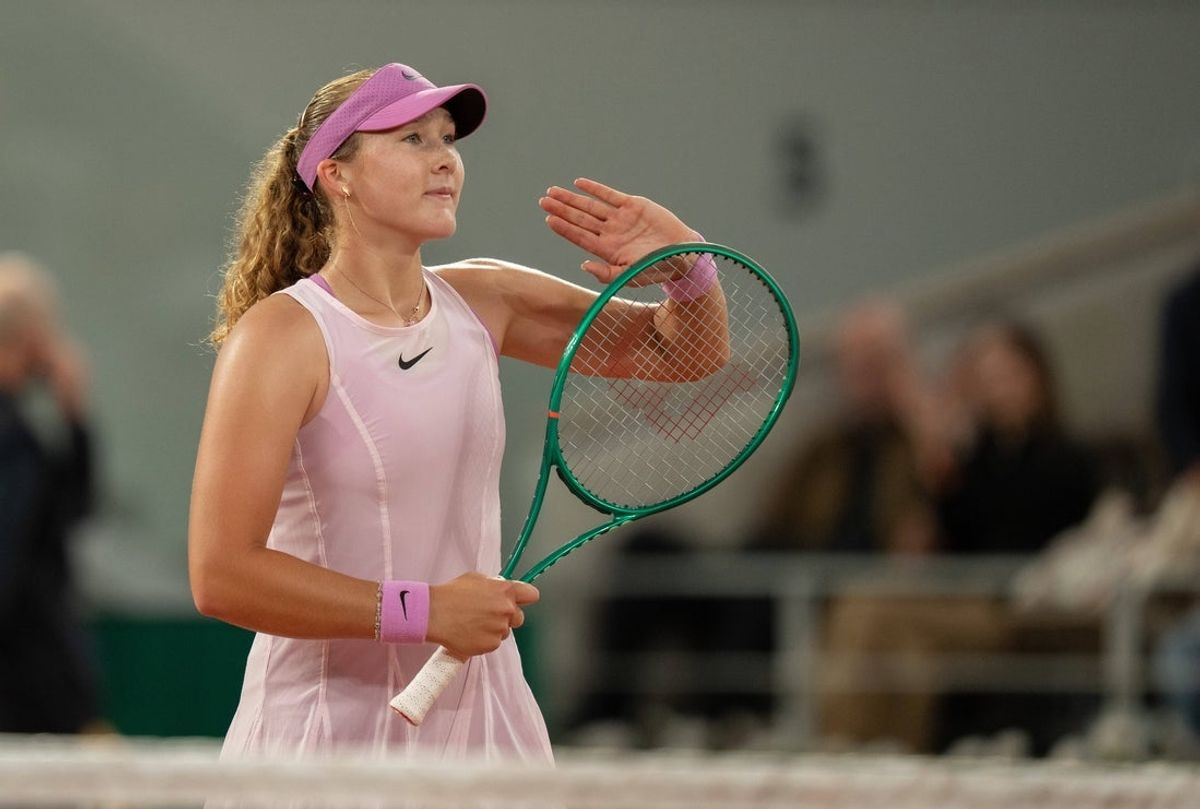 Jun 2, 2026; Paris, France; Mirra Andreeva celebrates winning her match against Sorana Cirstea of Romania on day 10 at Stade Roland Garros. Mandatory Credit: Susan Mullane-Imagn Images
