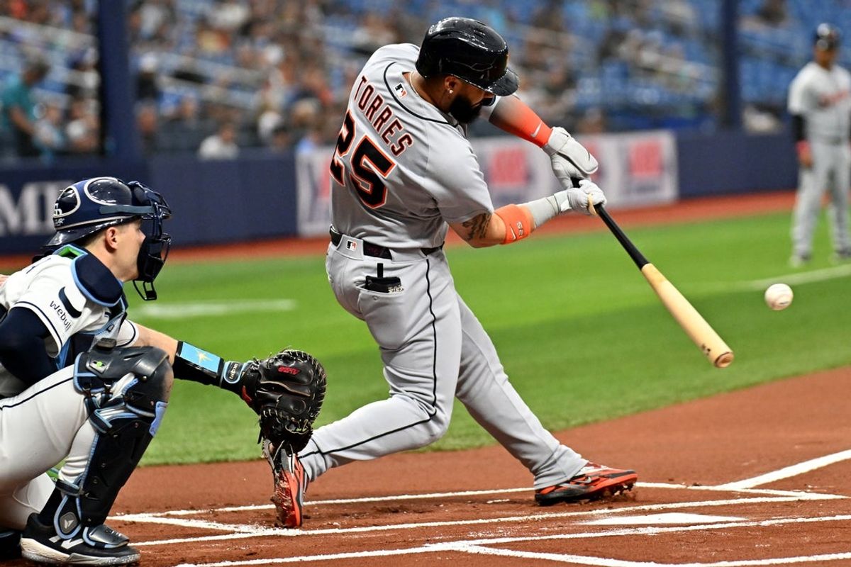 Jun 2, 2026; St. Petersburg, Florida, USA; Detroit Tigers second baseman Gleyber Torres (25) hits a solo home run in the first inning against the Tampa Bay Rays at Tropicana Field. Mandatory Credit: Jonathan Dyer-Imagn Images