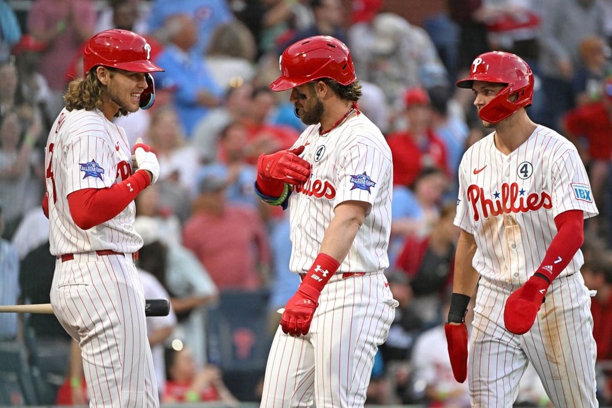 Jun 2, 2026; Philadelphia, Pennsylvania, USA; Philadelphia Phillies first baseman Bryce Harper (3) celebrates his two-run home run with third baseman Alec Bohm (28) and shortstop Trea Turner (7)  against the San Diego Padres during the fourth inning at Citizens Bank Park. Mandatory Credit: Eric Hartline-Imagn Images