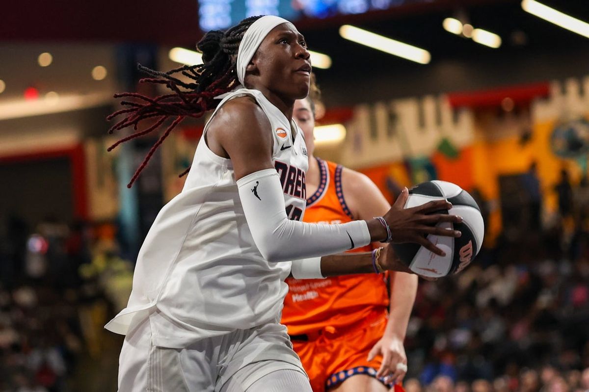 Jun 2, 2026; College Park, Georgia, USA; Atlanta Dream guard Rhyne Howard (10) drives to the basket against the Connecticut Sun in the first quarter at Gateway Center Arena at College Park. Mandatory Credit: Brett Davis-Imagn Images