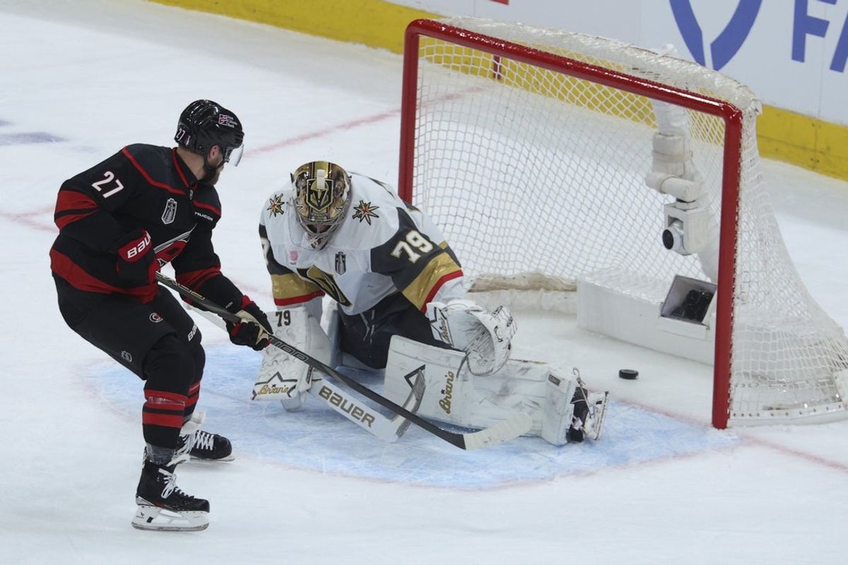 Jun 2, 2026; Raleigh, North Carolina, USA; Carolina Hurricanes left wing Nikolaj Ehlers (27) scores a second goal during the first period against Vegas Golden Knights goaltender Carter Hart (79) in game one of the 2026 Stanley Cup Final at Lenovo Center. Mandatory Credit: Nathan Ray Seebeck-Imagn Images