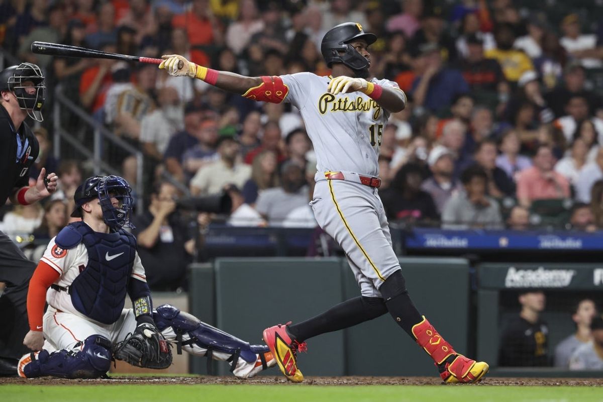 Jun 2, 2026; Houston, Texas, USA; Pittsburgh Pirates center fielder Oneil Cruz (15) hits a three-run home run during the sixth inning against the Houston Astros at Daikin Park. Mandatory Credit: Troy Taormina-Imagn Images