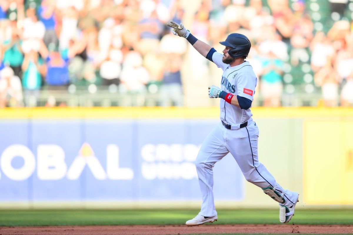 Jun 2, 2026; Seattle, Washington, USA; Seattle Mariners first baseman Patrick Wisdom (35) runs the bases after hitting a 2-run home run against the New York Mets during the second inning at T-Mobile Park. Mandatory Credit: Steven Bisig-Imagn Images