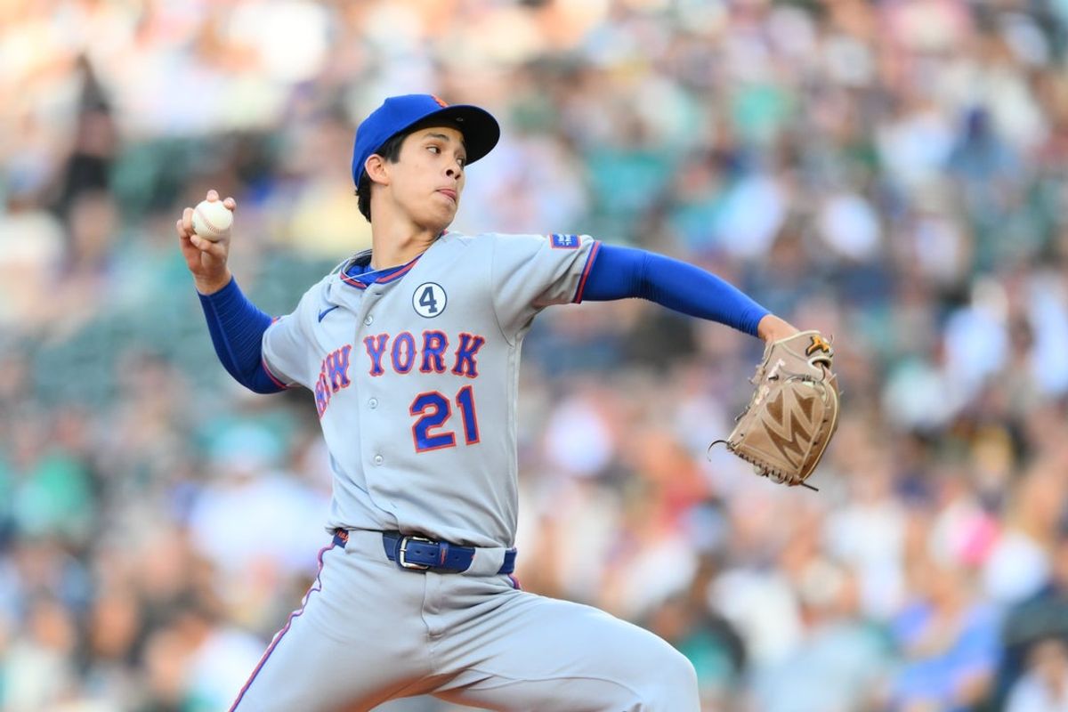 Jun 2, 2026; Seattle, Washington, USA; New York Mets relief pitcher Jonah Tong (21) pitches to the Seattle Mariners during the second inning at T-Mobile Park. Mandatory Credit: Steven Bisig-Imagn Images