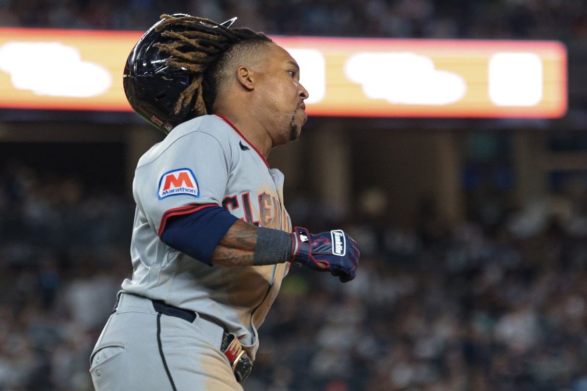 Jun 2, 2026; Bronx, New York, USA; Cleveland Guardians third baseman Jose Ramirez (11) runs out an RBI double during the seventh inning against the New York Yankees at Yankee Stadium. Mandatory Credit: Vincent Carchietta-Imagn Images