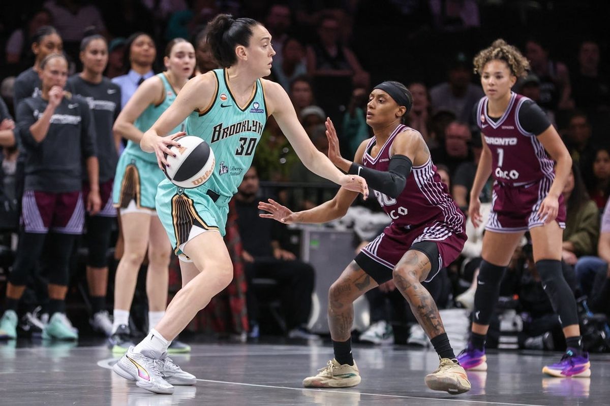 Jun 3, 2026; Brooklyn, New York, USA;  New York Liberty forward Breanna Stewart (30) looks to drive past Toronto Tempo guard Brittney Sykes (20) in the first quarter at Barclays Center. Mandatory Credit: Wendell Cruz-Imagn Images