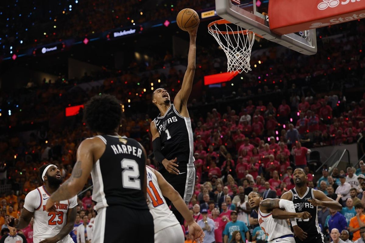 Jun 3, 2026; San Antonio, Texas, USA; San Antonio Spurs forward Victor Wembanyama (1) shoots the ball against the New York Knicks in the second half during game one of the 2026 NBA Finals at Frost Bank Center. Mandatory Credit: Geoff Burke-Imagn Images