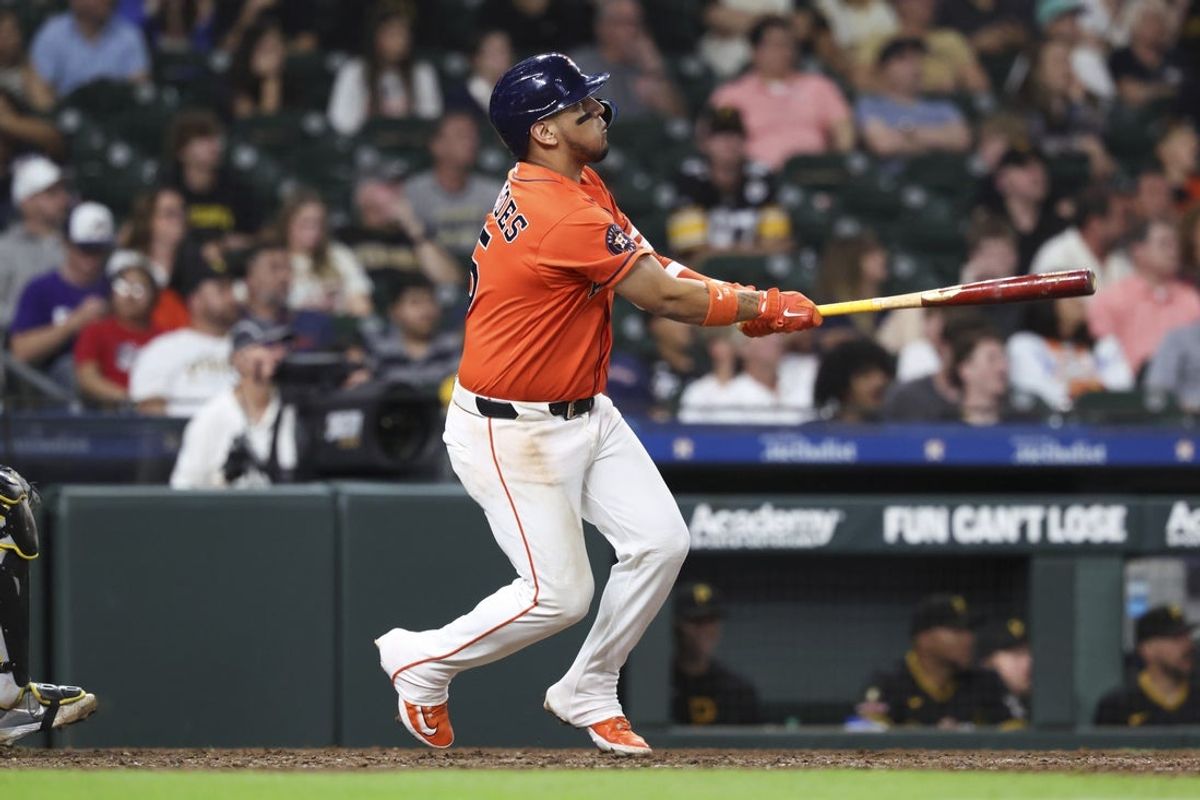 Jun 3, 2026; Houston, Texas, USA; Houston Astros third baseman Isaac Paredes (15) hits a two-run home run during the seventh inning against the Pittsburgh Pirates at Daikin Park. Mandatory Credit: Troy Taormina-Imagn Images
