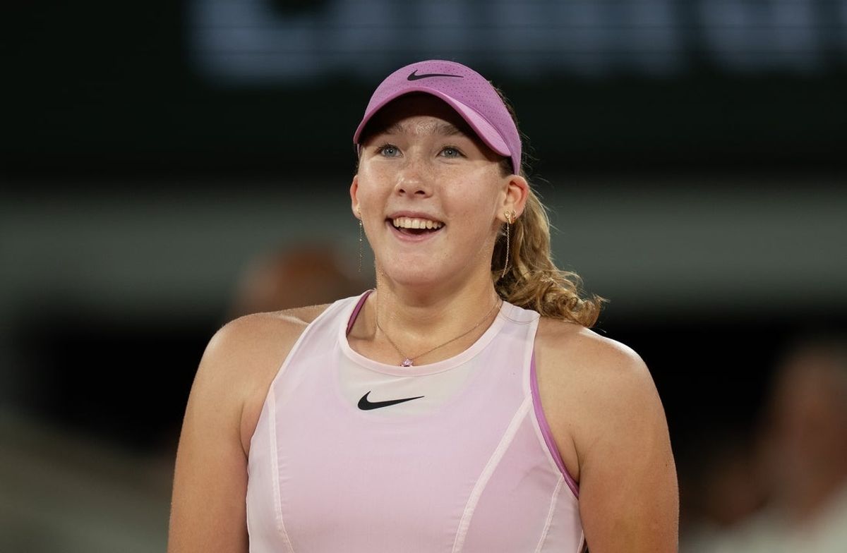 Jun 4, 2026; Paris, France;  Mirra Andreeva at her interview on the court after winning  her match against Marta Kostyuk of Ukraine on day 12 at Stade Roland Garros. Mandatory Credit: Susan Mullane-Imagn Images