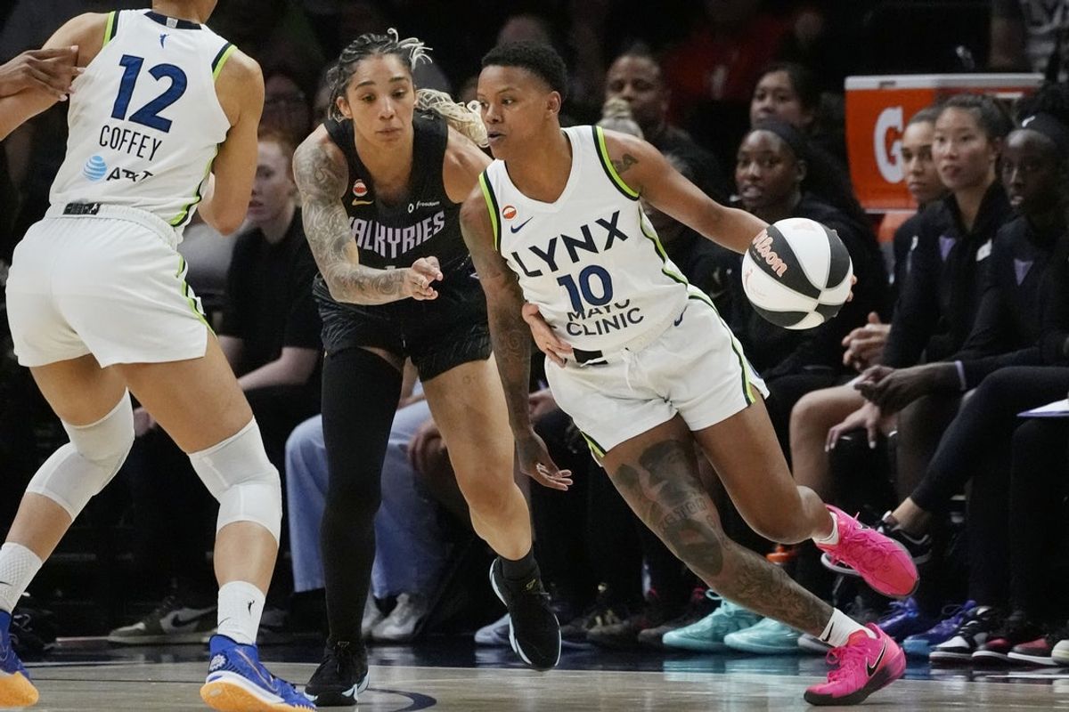 Jun 4, 2026; Minneapolis, Minnesota, USA; Minnesota Lynx guard Courtney Williams (10) dribbles the ball against Golden State Valkyries forward Gabby Williams (1) in the first quarter at Target Center. Mandatory Credit: Bruce Kluckhohn-Imagn Images