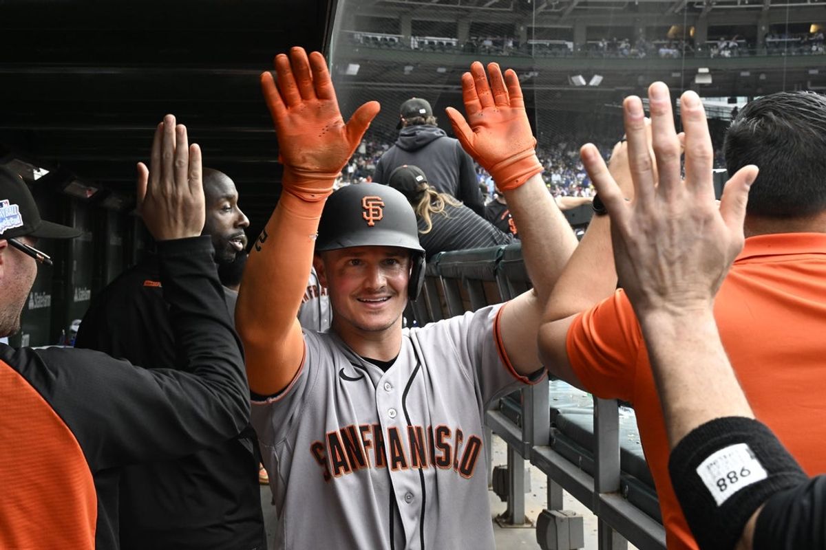 Jun 5, 2026; Chicago, Illinois, USA;  San Francisco Giants third baseman Matt Chapman (26) celebrates in the dugout after hitting a three run home run against the Chicago Cubs during the sixth inning  at Wrigley Field. Mandatory Credit: Matt Marton-Imagn Images