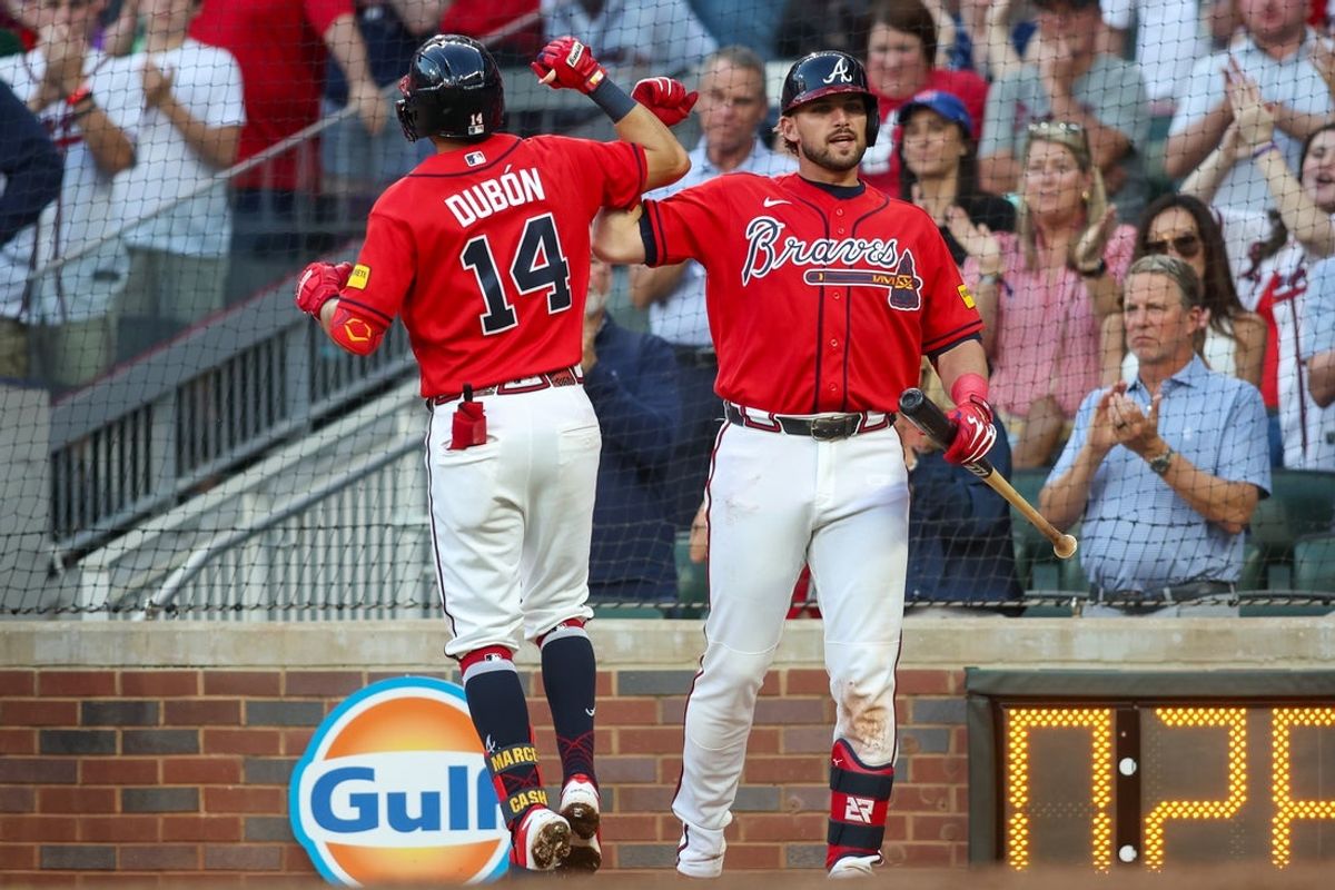 Jun 5, 2026; Atlanta, Georgia, USA; Atlanta Braves shortstop Mauricio Dubon (14) celebrates with third baseman Austin Riley (27) after a two-run home run against the Pittsburgh Pirates in the third inning at Truist Park. Mandatory Credit: Brett Davis-Imagn Images