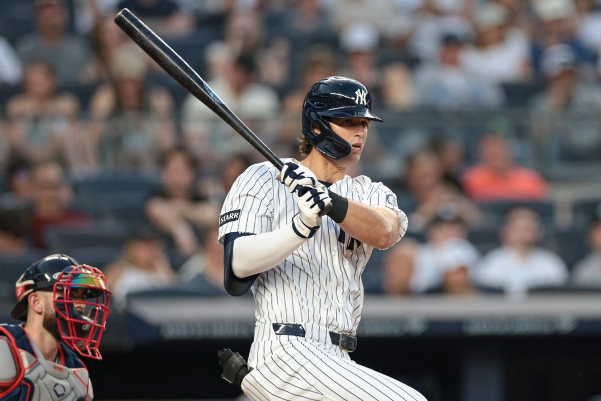 Jun 5, 2026; Bronx, New York, USA; New York Yankees right fielder Spencer Jones (78) hits an RBI double during the fourth inning against the Boston Red Sox at Yankee Stadium. Mandatory Credit: Vincent Carchietta-Imagn Images