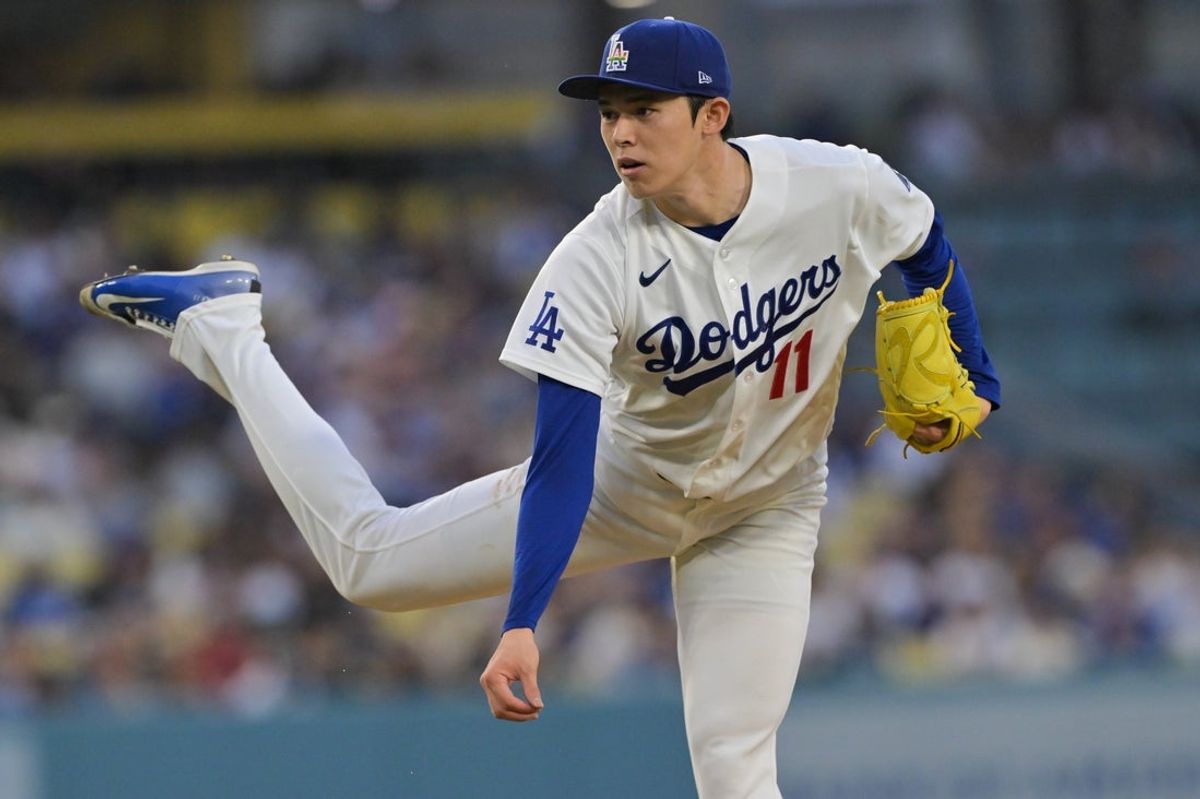 Jun 5, 2026; Los Angeles, California, USA;  Los Angeles Dodgers pitcher Roki Sasaki (11) pitches during the third inning against the Los Angeles Angels at Dodger Stadium. Mandatory Credit: Jayne Kamin-Oncea-Imagn Images