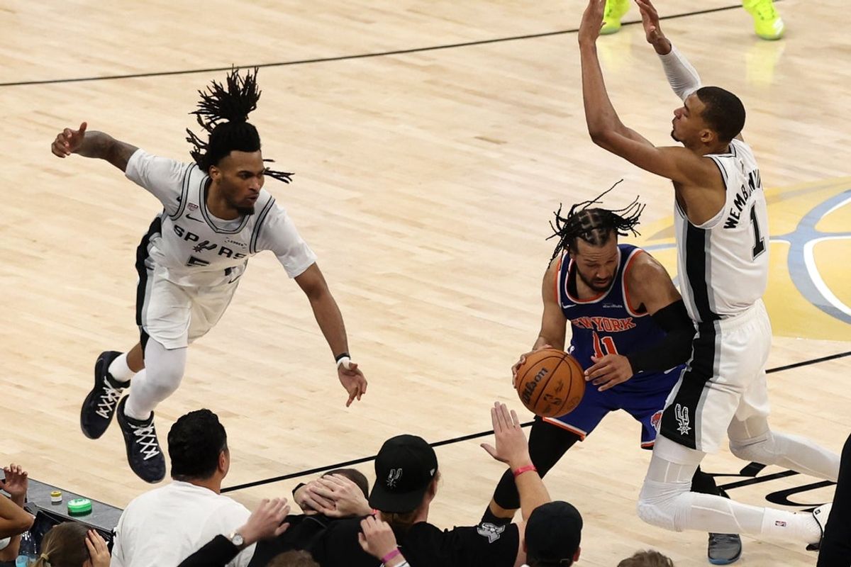 Jun 5, 2026; San Antonio, Texas, USA; San Antonio Spurs forward Victor Wembanyama (1) fouls New York Knicks guard Jalen Brunson (11) in the closing seconds in the second half during game two of the 2026 NBA Finals at Frost Bank Center. Mandatory Credit: Geoff Burke-Imagn Images