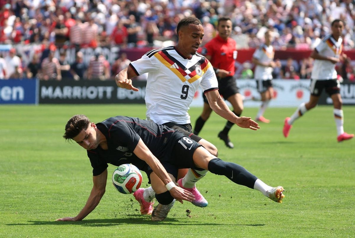 June 6, 2026; Chicago, Illinois, U.S.; Germany's Jamie Leweling in action with Max Arfsten of the U.S.  Mandatory Credit: Talia Sprague-Imagn Images