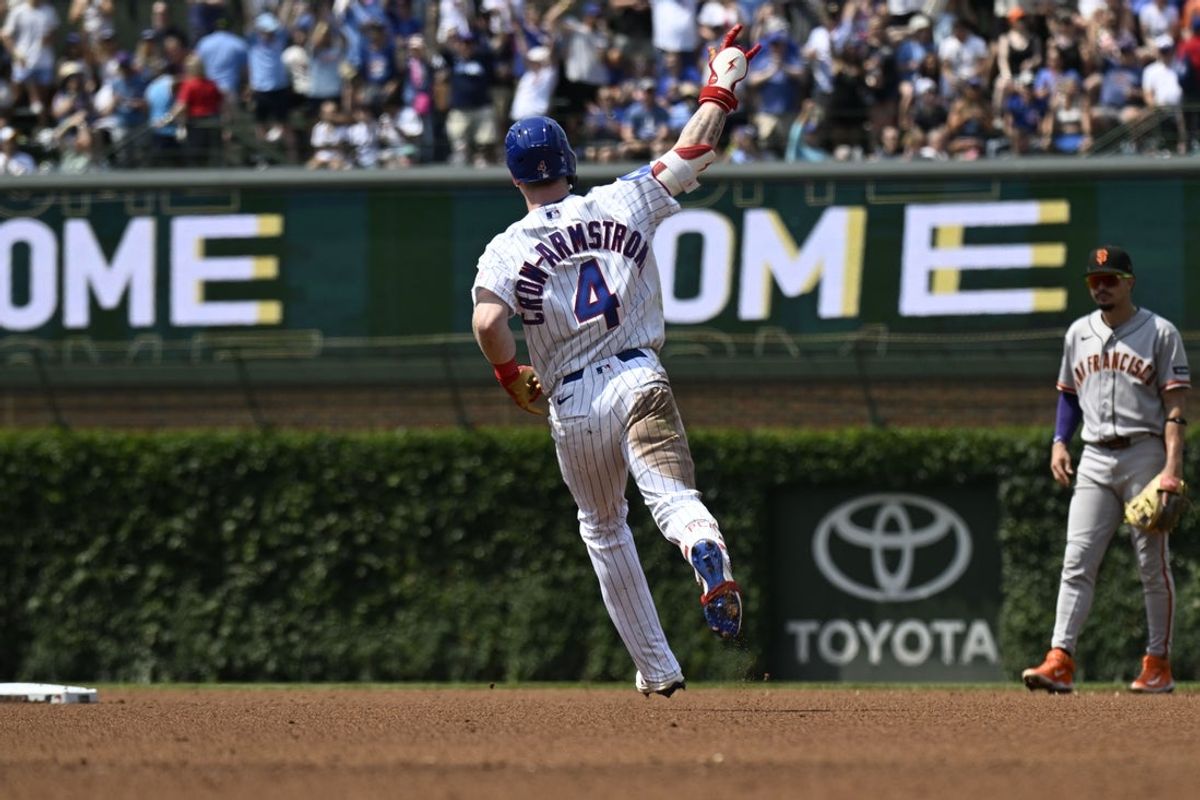 Jun 6, 2026; Chicago, Illinois, USA;  Chicago Cubs center fielder Pete Crow-Armstrong (4) points after he hits a home run during the sixth inning against the San Francisco Giants at Wrigley Field. Mandatory Credit: Matt Marton-Imagn Images