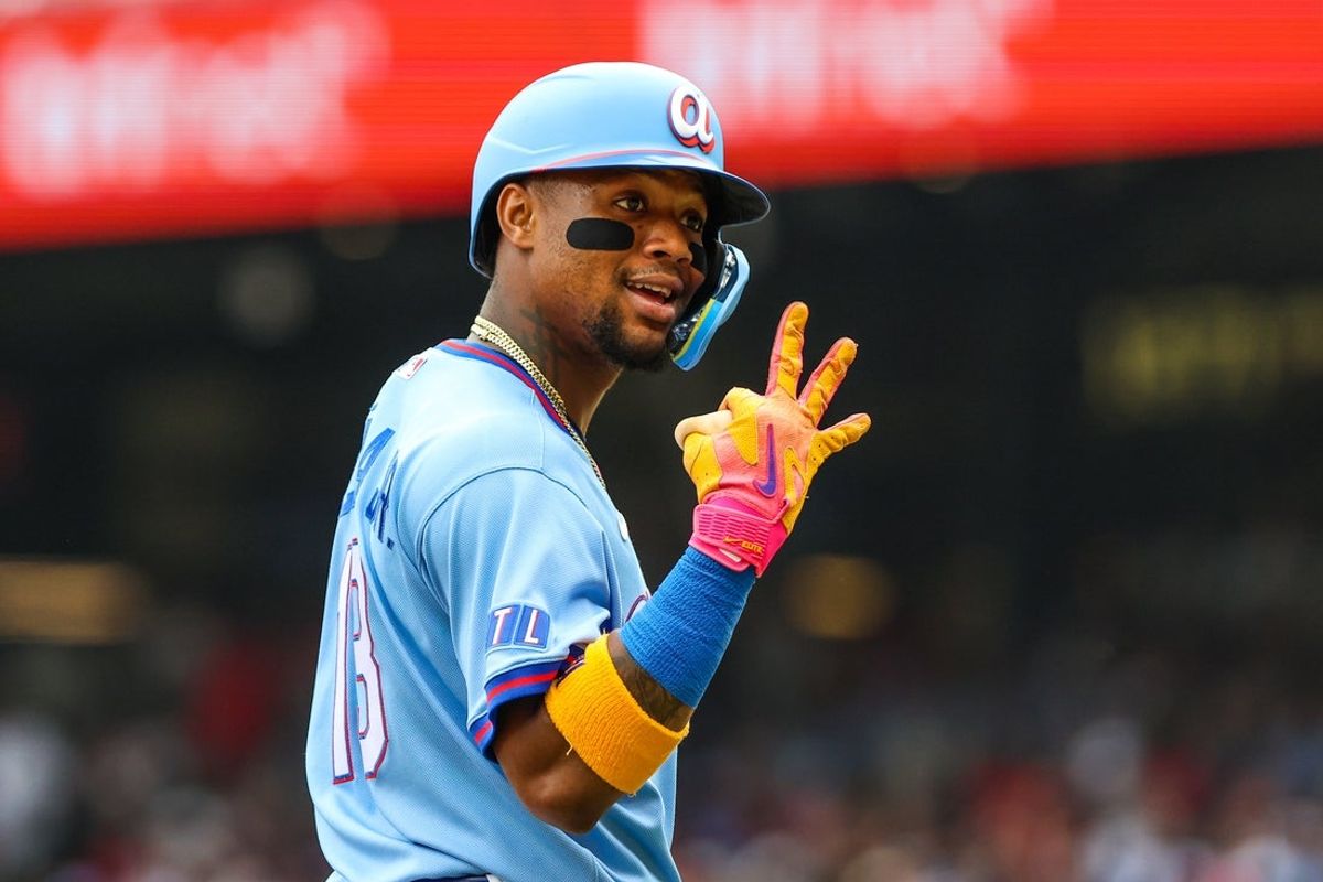 Jun 6, 2026; Cumberland, Georgia, USA; Atlanta Braves right fielder Ronald Acuña Jr. (13) talks to the Pittsburgh Pirates dugout during the game against the Pittsburgh Pirates during the first inning at Truist Park. Mandatory Credit: Jordan Godfree-Imagn Images
