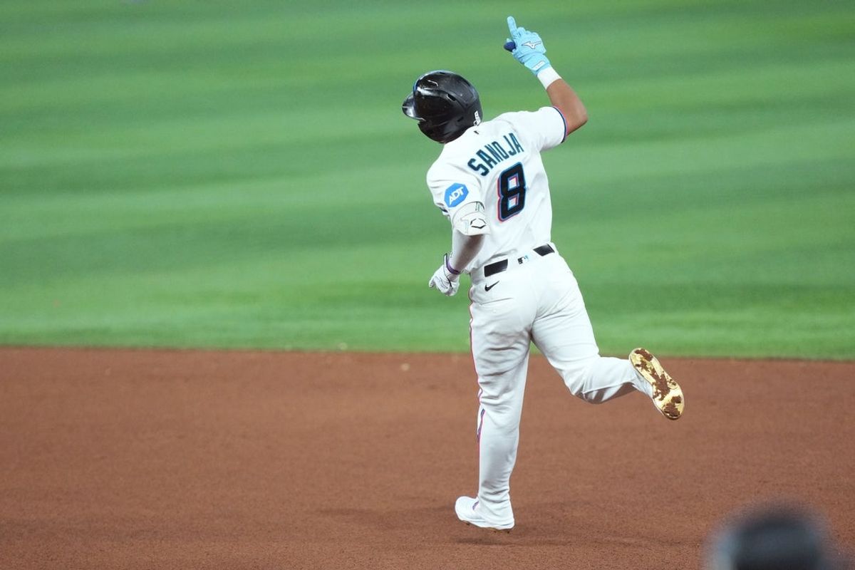 Jun 6, 2026; Miami, Florida, USA;  Miami Marlins third baseman Javier Sanoja (8) celebrates a home run against the Tampa Bay Rays in the fifth inning at loanDepot Park. Mandatory Credit: Jim Rassol-Imagn Images